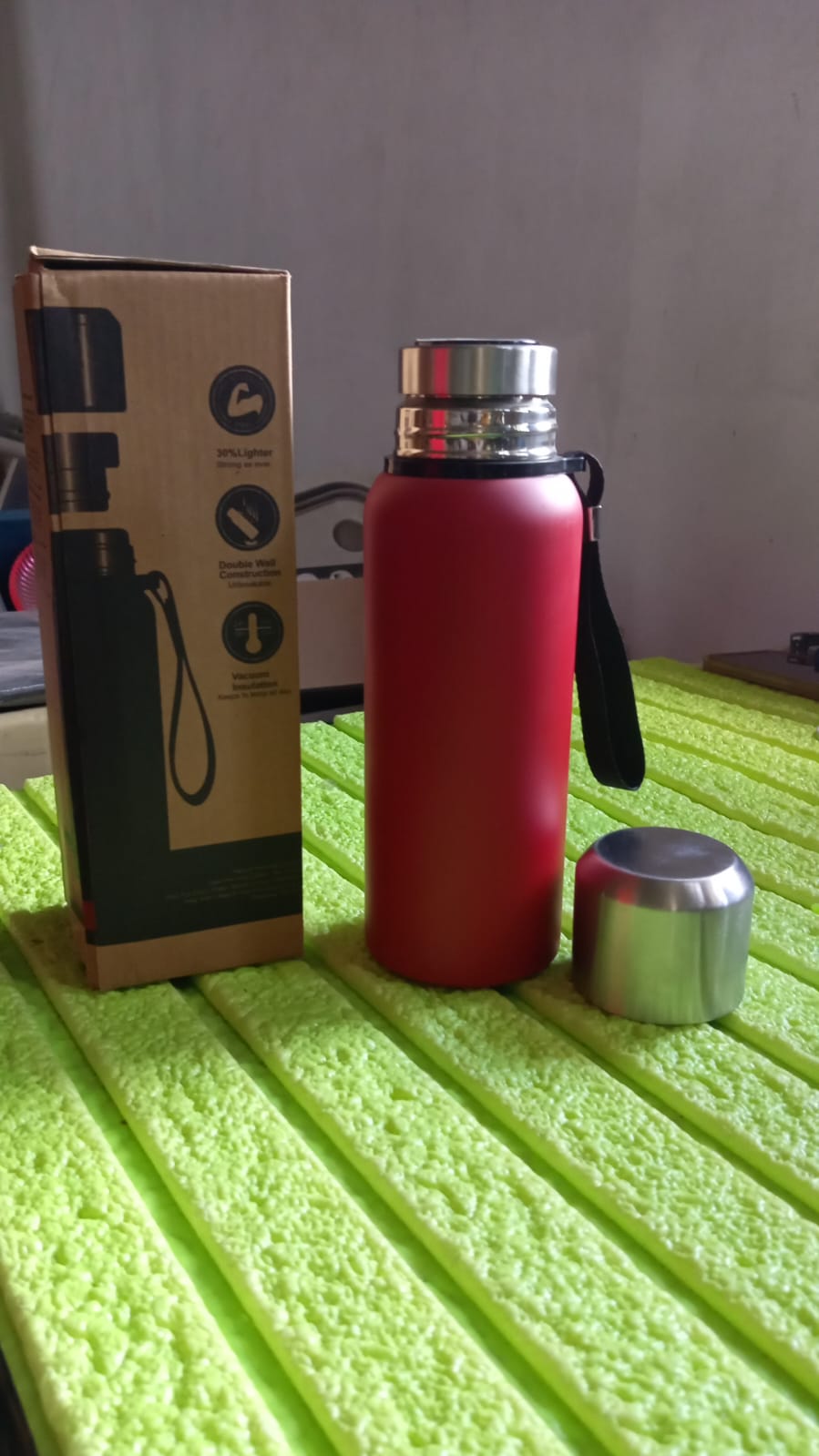 Compact 600ml stainless steel bottle, ideal for gym, office, or travel.