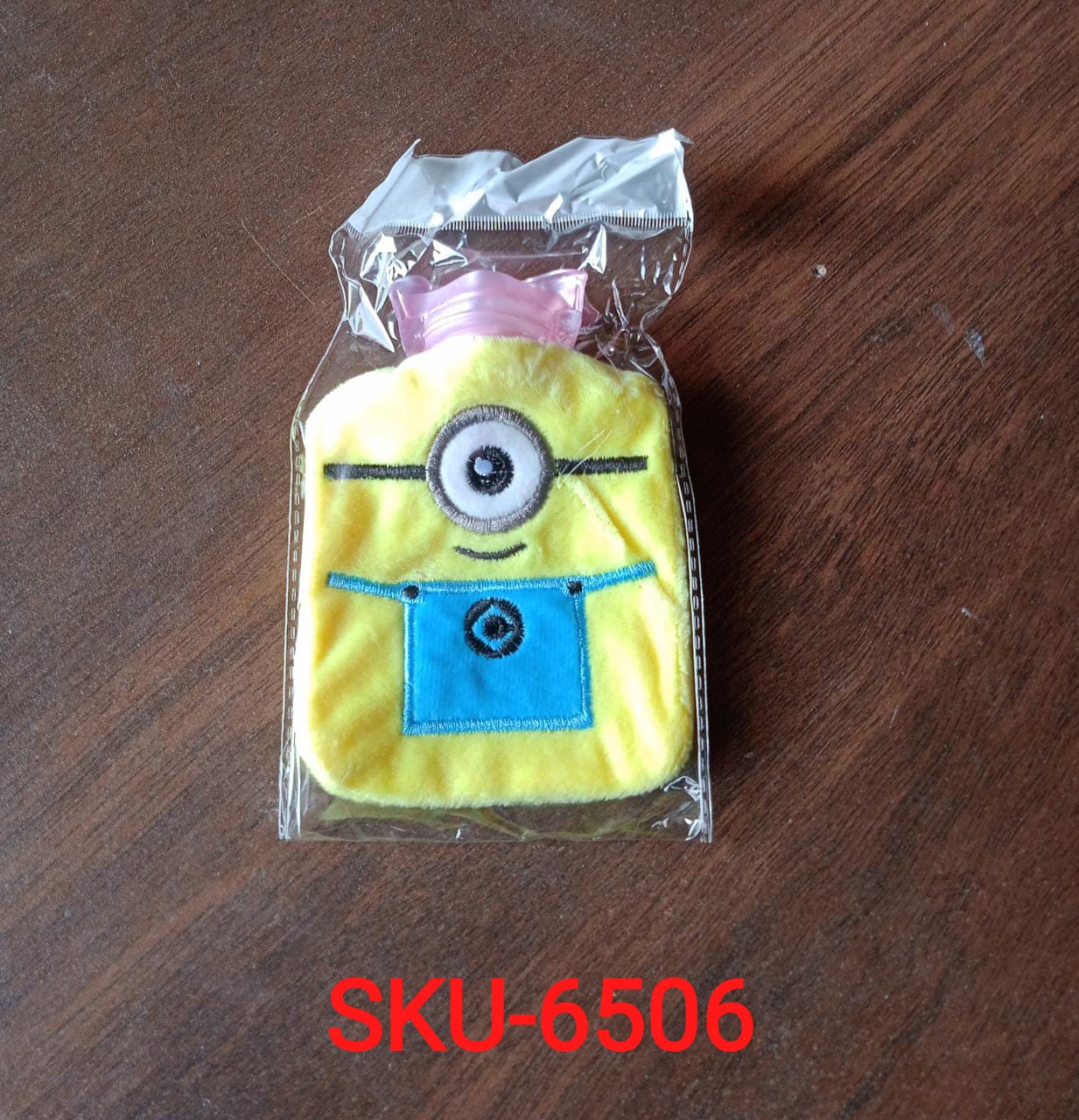 Another view of the Minions hot water bag, highlighting its fun design for all ages.