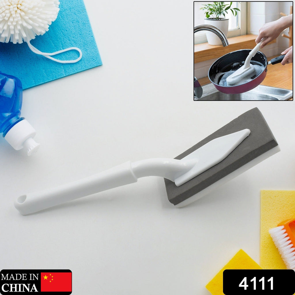 Versatile triangle cleaning brush effectively scrubbing a kitchen sink.