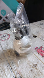 Detailed image of the faucet sprayer, showcasing its different spray patterns and build.