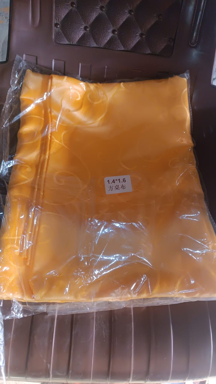 Polyester fabric table cover, washable and reusable, ideal for kitchen and cafe use.