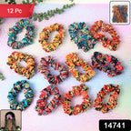 Woman styling hair with colorful printed hair scrunchies