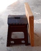 Generic image of a foldable table, not directly related to the folding stool.