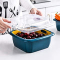 Double layer food drainer basket for washing fruits and vegetables.