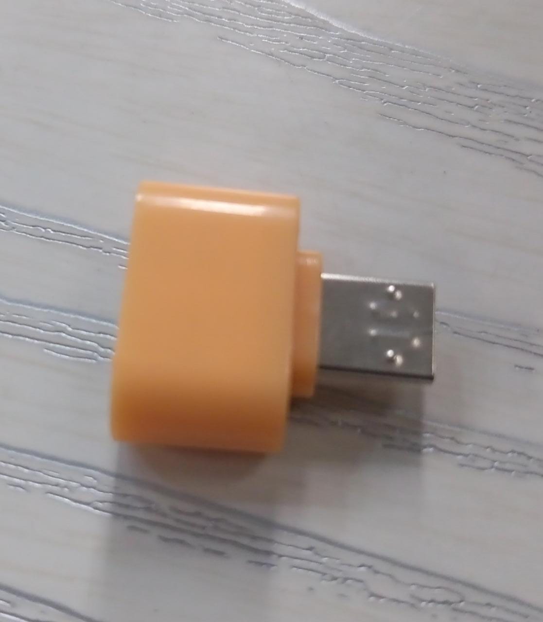 Detailed view of the Micro USB OTG adapter's connectors for reliable Android device pairing.