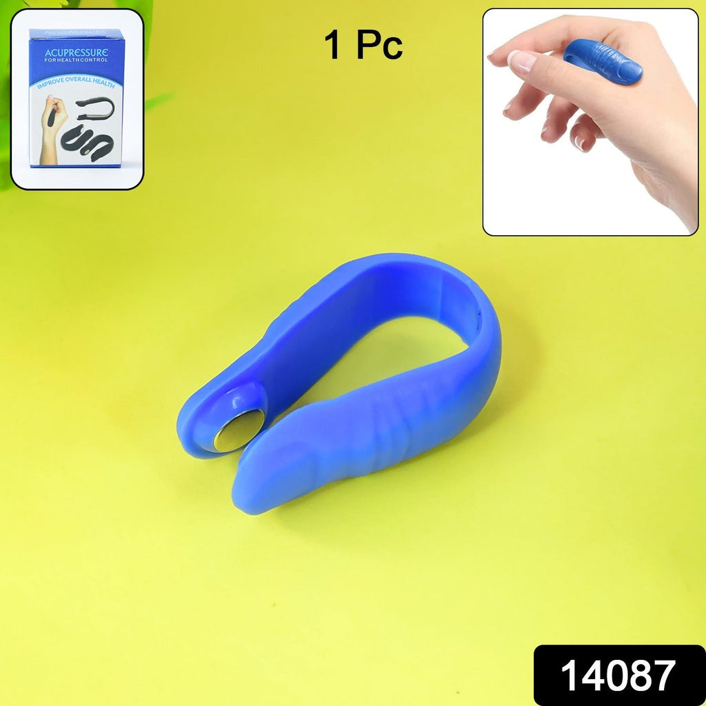 Close-up view of plastic magnetic acupressure clip for finger therapy
