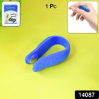 Close-up view of plastic magnetic acupressure clip for finger therapy