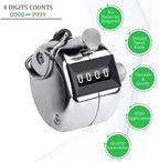 Close-up of the reset knob on the manual hand tally counter.
