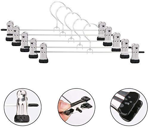A dozen stainless steel hangers featuring adjustable clips for various garments.