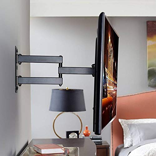 Adjustable TV wall mount installed on a white wall