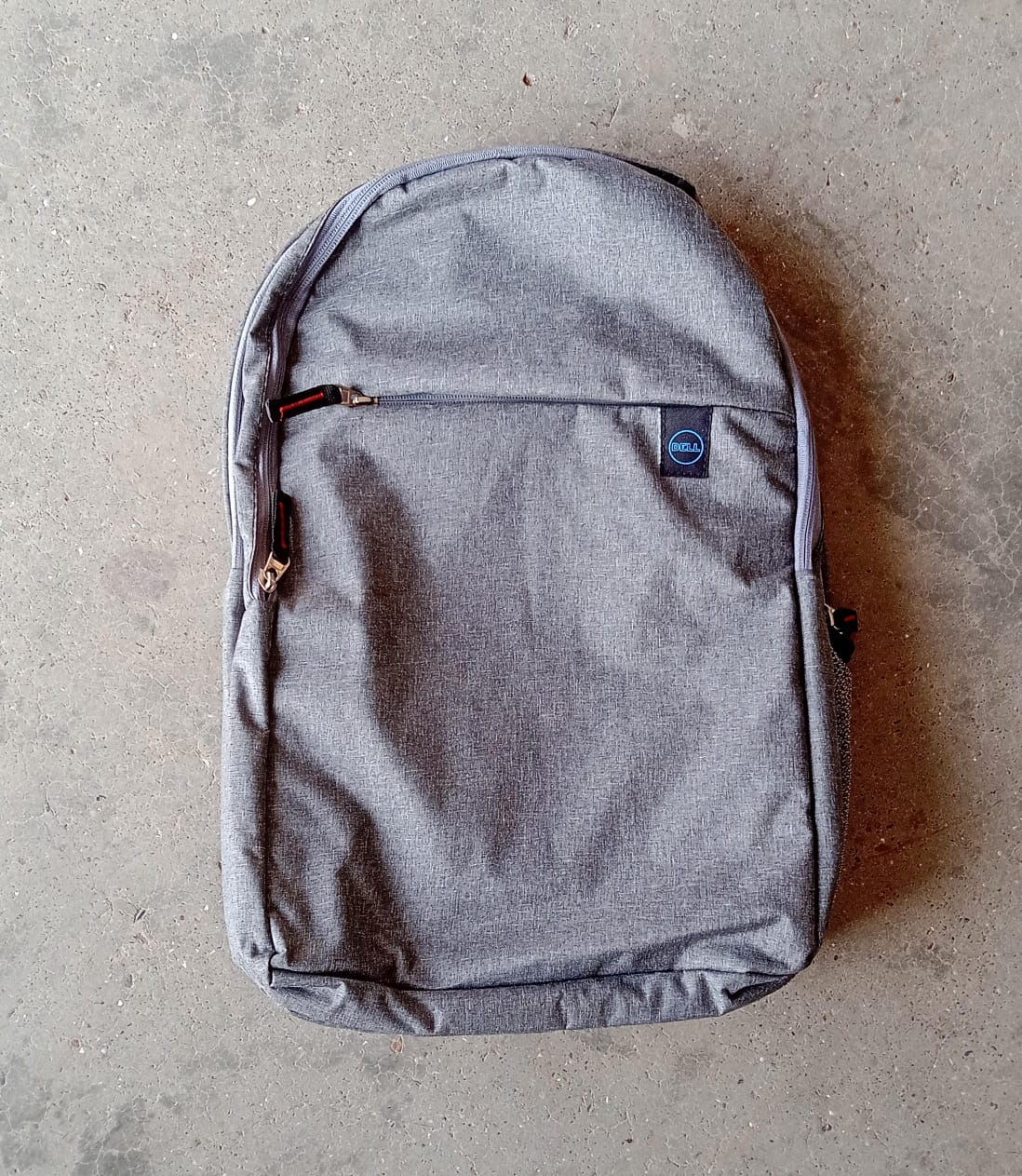 FERVENT laptop bag packed with daily essentials, demonstrating its ample storage capacity.