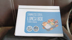 Side view of the durable stainless steel lunch box with a secure lid.
