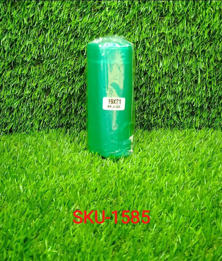 Green biodegradable garbage bags in a compact roll, ideal for responsible waste disposal.