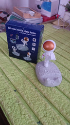 Overhead view of the creative Astronaut Phone Stand, showing its compact form.