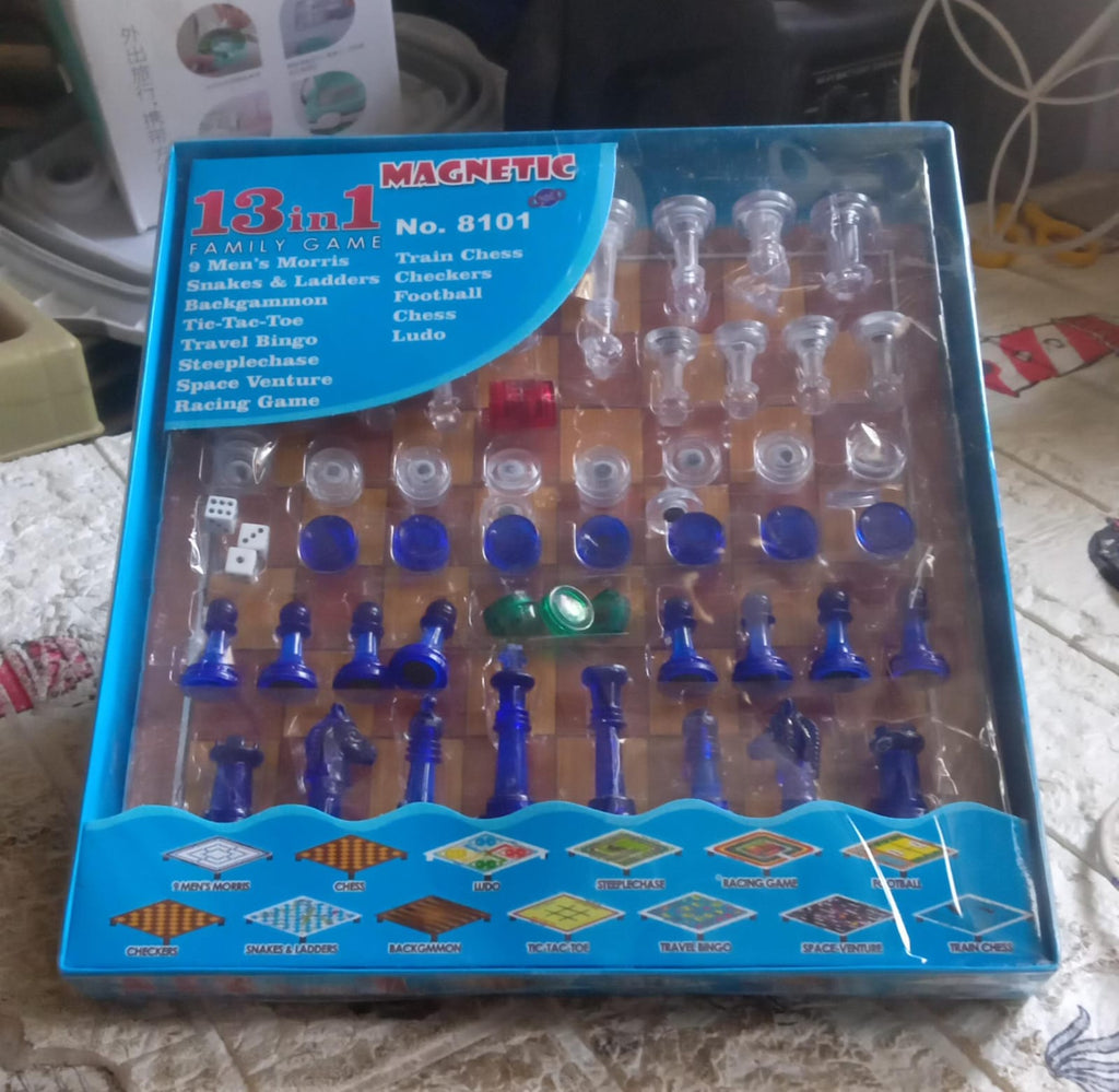 Retail packaging box for the Dollamis 13-in-1 Family Board Game Set.
