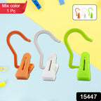 Close-up view of hanging hook clip's strong spring-loaded grip and rotatable hook