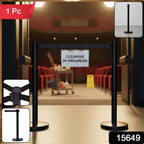 Barrier stand crowd control pole with retractable belt in commercial setting