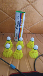 Set of six durable plastic shuttlecocks stacked for badminton play