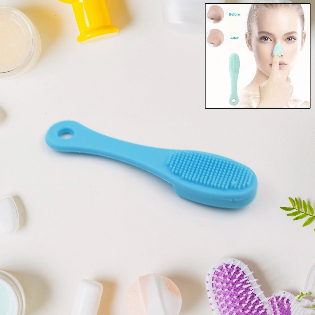 A hand holds the VelvaBloom silicone finger scrubber for gentle facial cleansing.