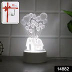 Close-up of 3D Illusion LED Night Lamp showing detailed house and balloons design