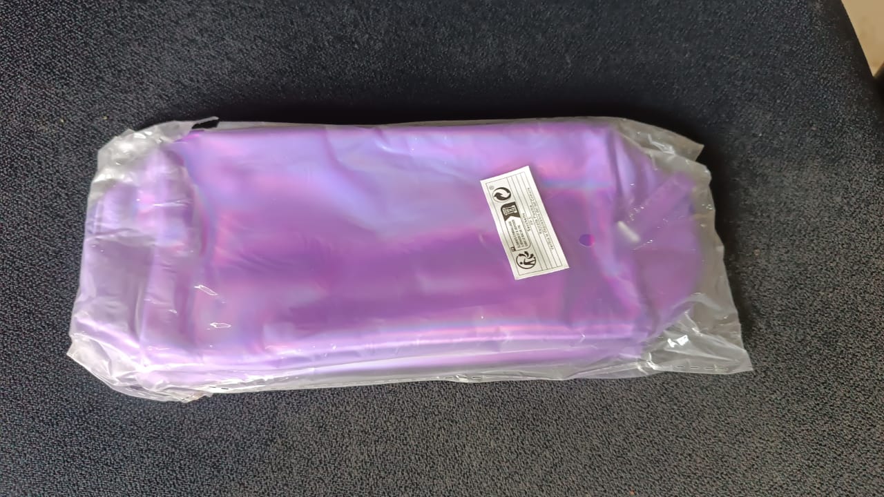 Neutral image showing holographic waterproof travel cosmetic pouch