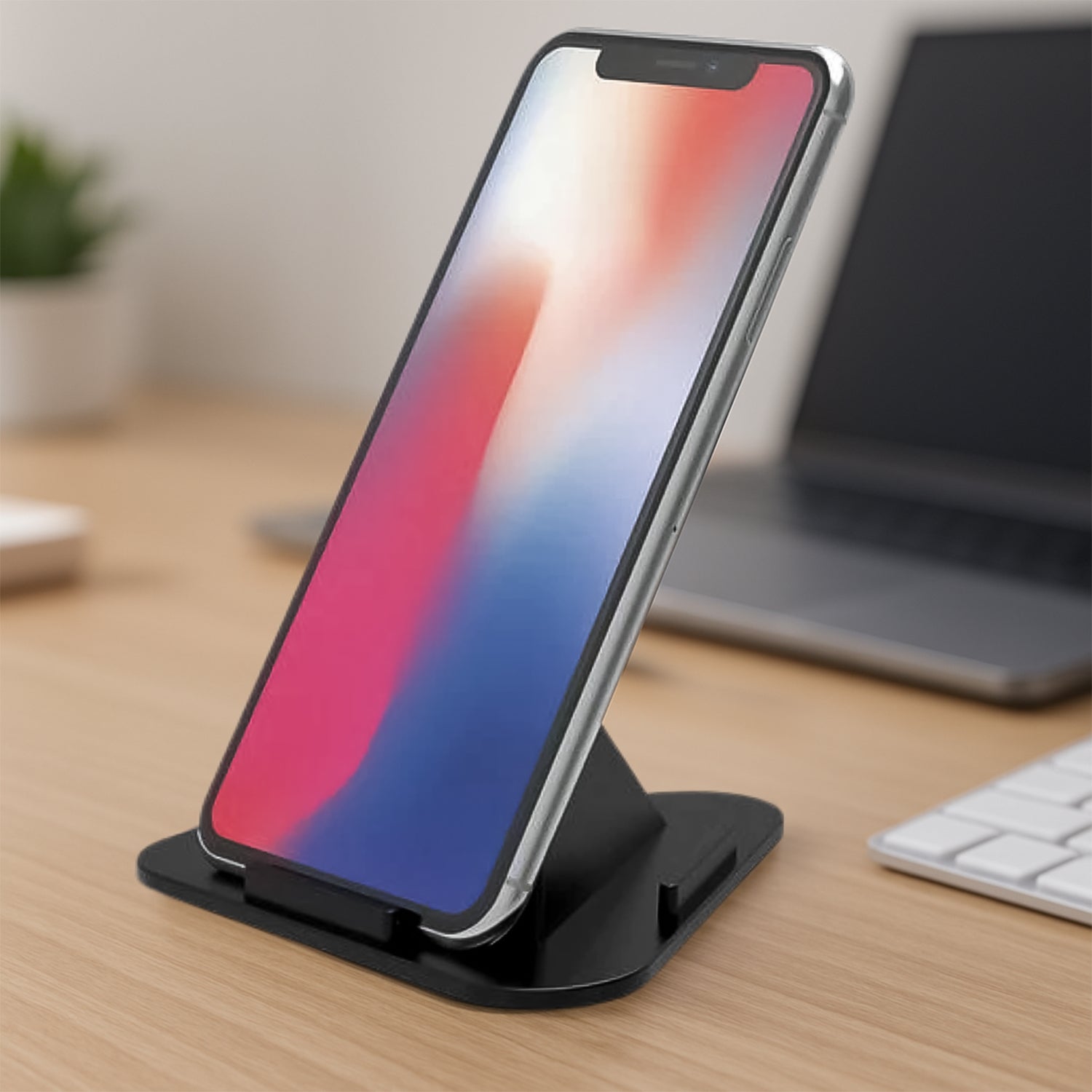 Pack of four Pyramid Mobile Holder Stands in black, showcasing their three-sided design.