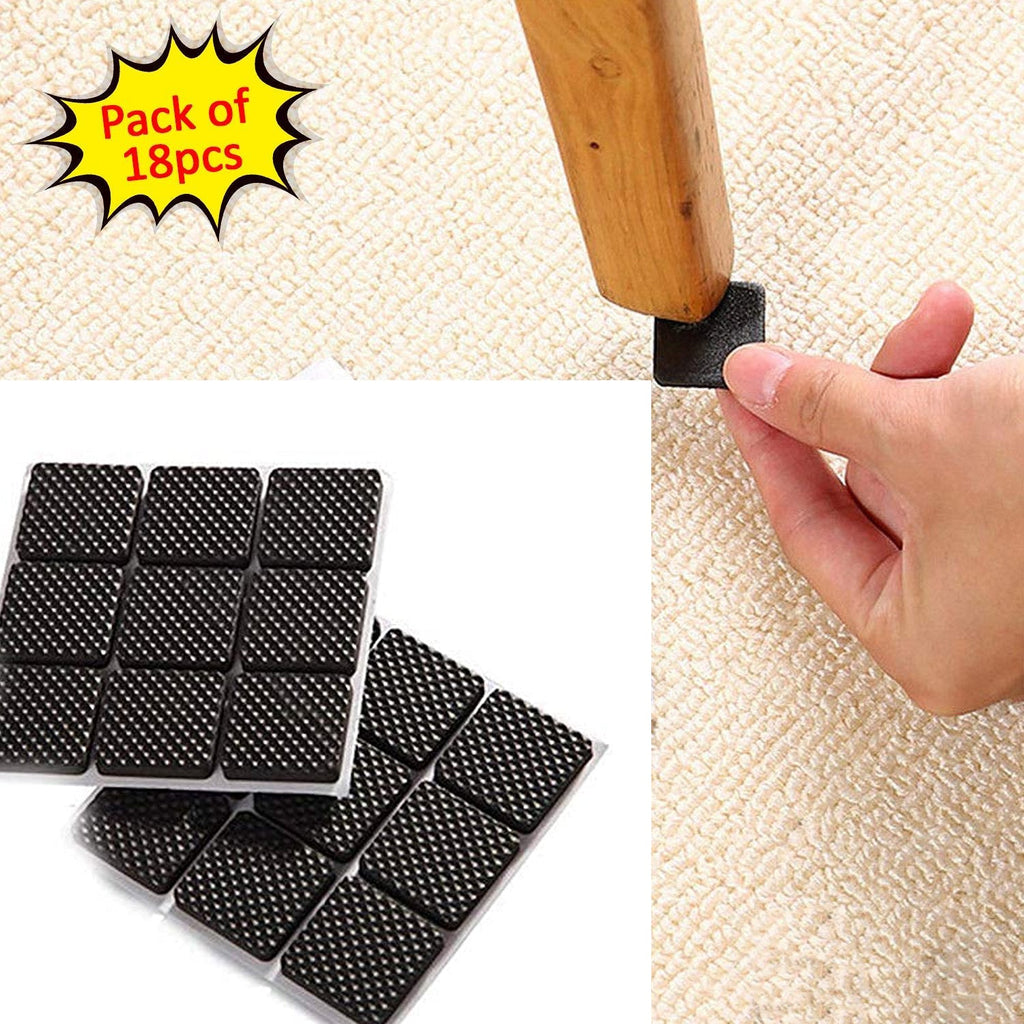 Square self-adhesive furniture pads protecting a wooden floor from scratches.