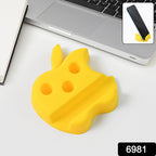 Colorful apple-shaped mobile stand holding a phone and pens