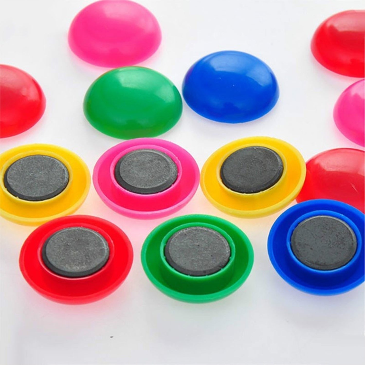 Close-up view of colorful circular board magnets, perfect for whiteboards.