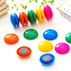 Close-up of vibrant round magnetic buttons for educational play.