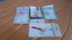 Collection of assorted acrylic and metal keychains