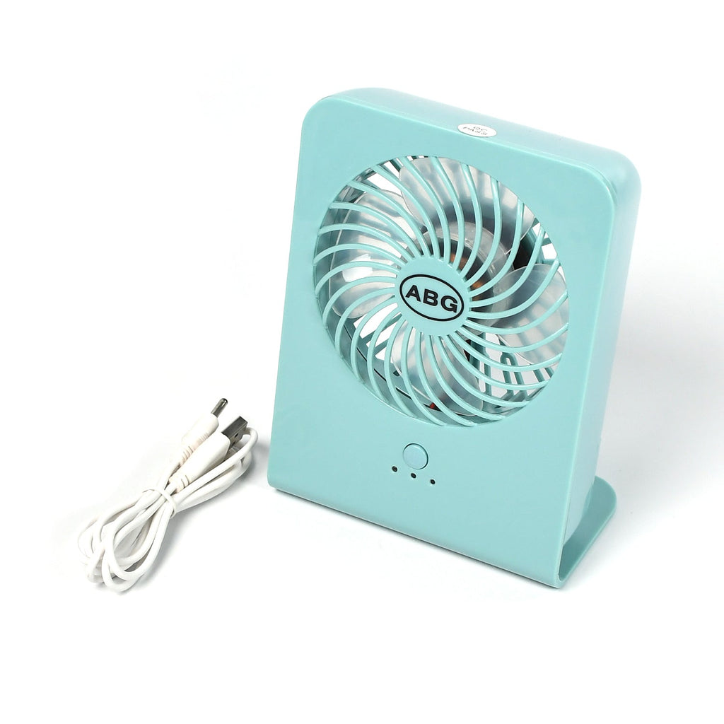 Close-up of the quiet four-blade design within the portable desk fan.