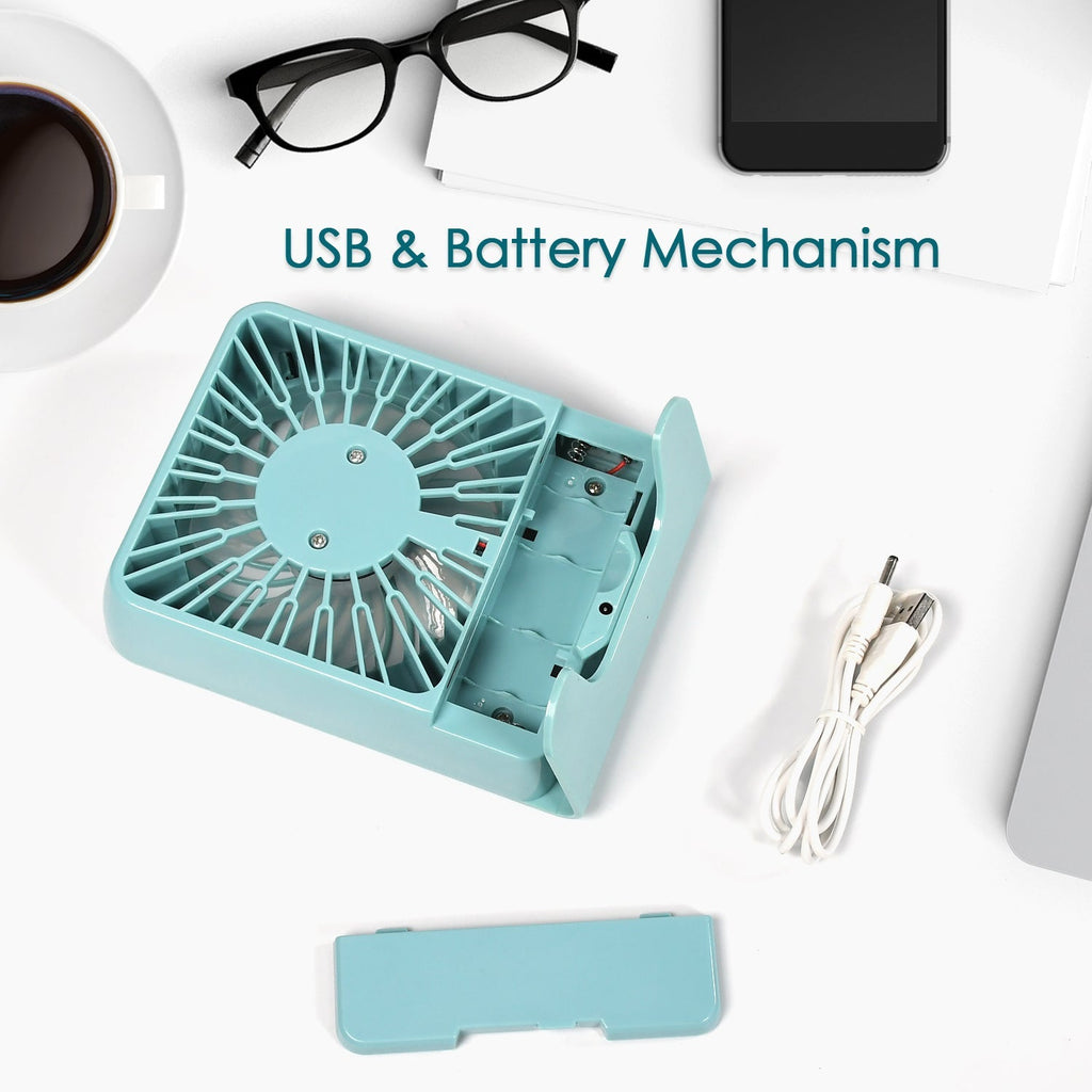 Back view of the compact portable desk fan, showing its simple design.