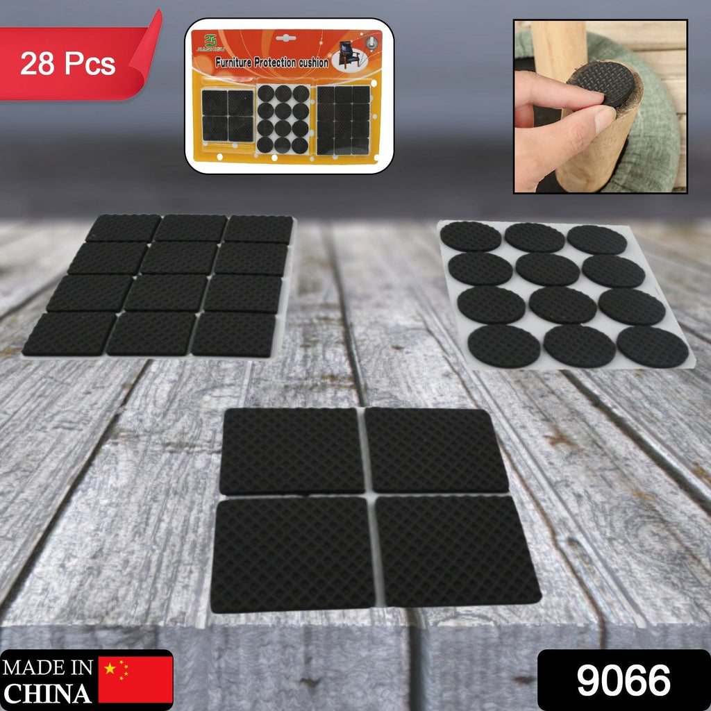 Rubber furniture pads securely attached to a chair leg, preventing floor damage.