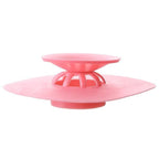 Silicone drainer cover placed on kitchen sink for clog prevention