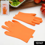 Close-up of the stainless steel blade and silicone finger protector on the thumb knife glove.