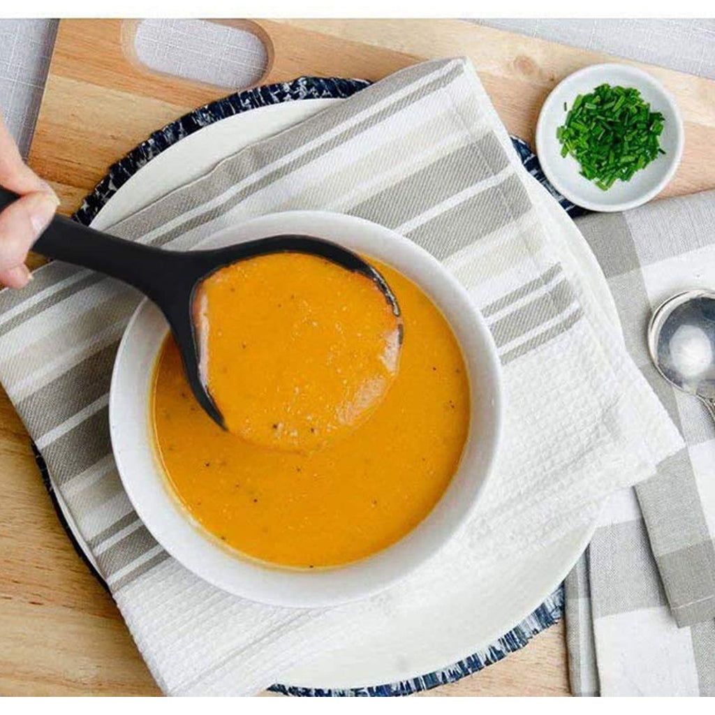 Detailed view of the ergonomic handles and non-scratch heads of the non-stick utensils.