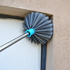 Detail of the telescopic mechanism on the extendable handle of the cobweb cleaning brush.