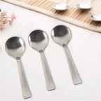 Dining spoons showing ergonomic handles and smooth oval bowls