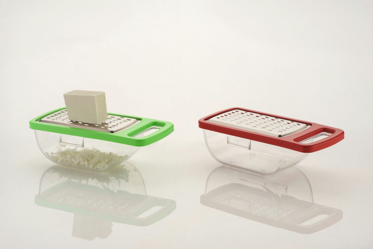Quickslice multi-functional cheese grater with a detachable container for easy kitchen use.
