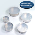 Airtight stainless steel container with a secure, leak-proof plastic lid.