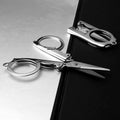 Compact 3.5-inch folding scissor, ideal for crafting and art projects.