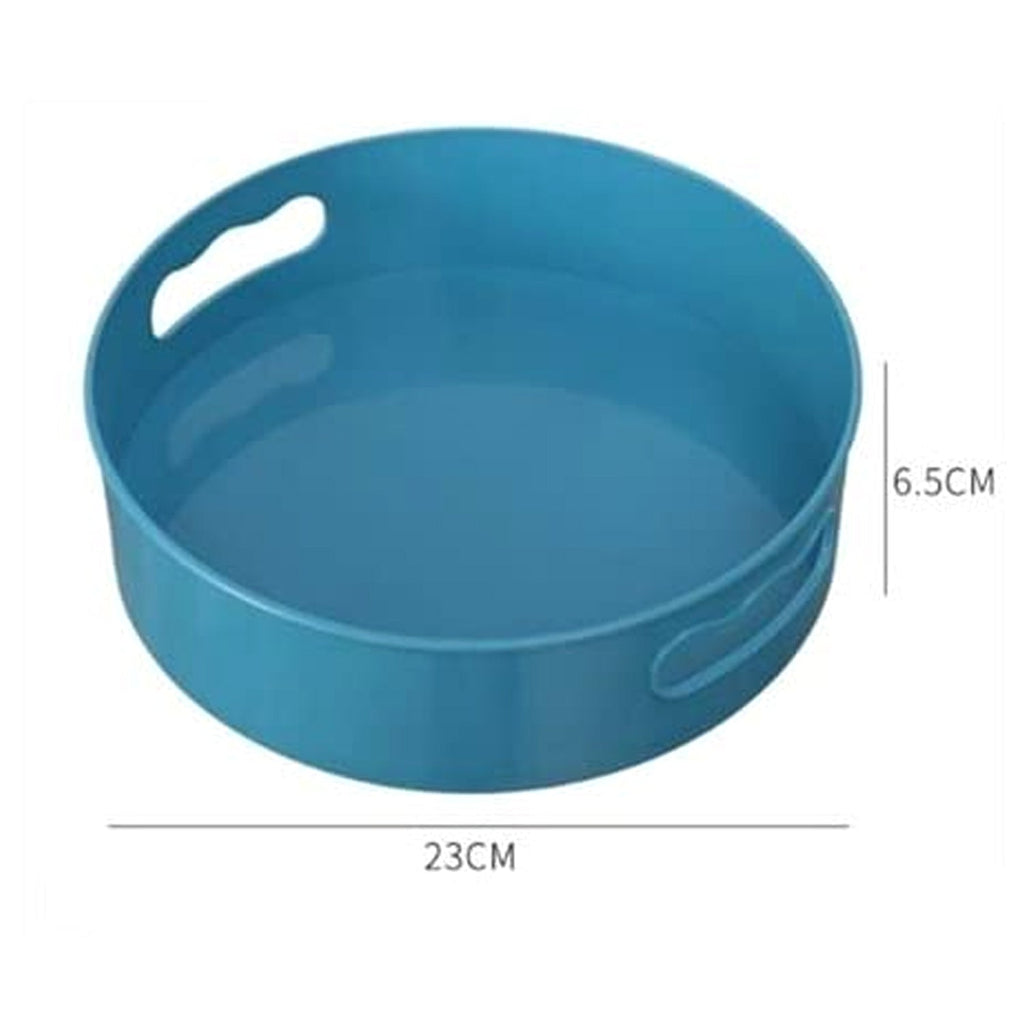 Revolving storage organizer tray keeping a kitchen countertop tidy.