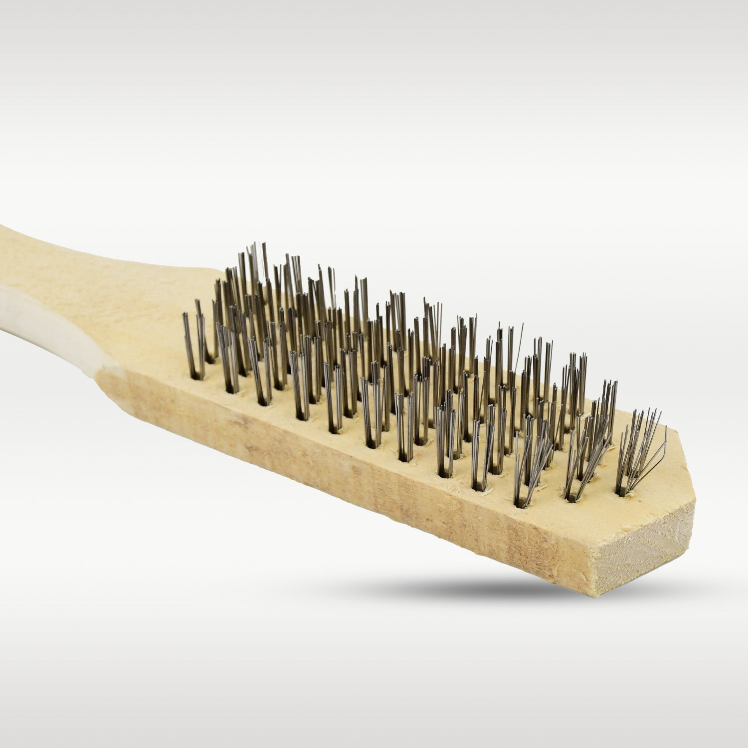 Close-up of the steel wire brush bristles for effective scrubbing.