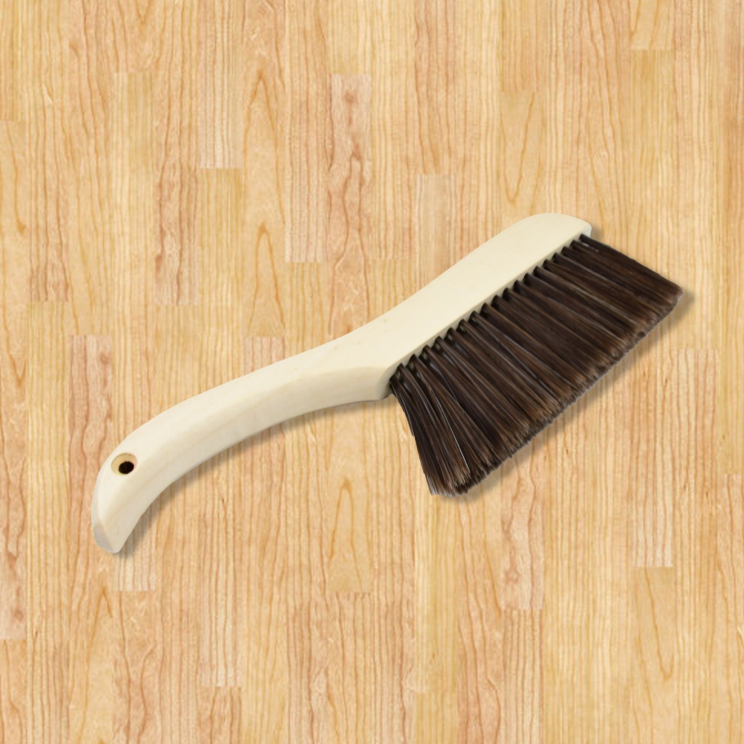 Desk and sofa duster brush with soft bristles, ideal for upholstery and furniture.