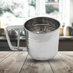 Top-down view of the manual flour sifter, ready for sifting various flours.