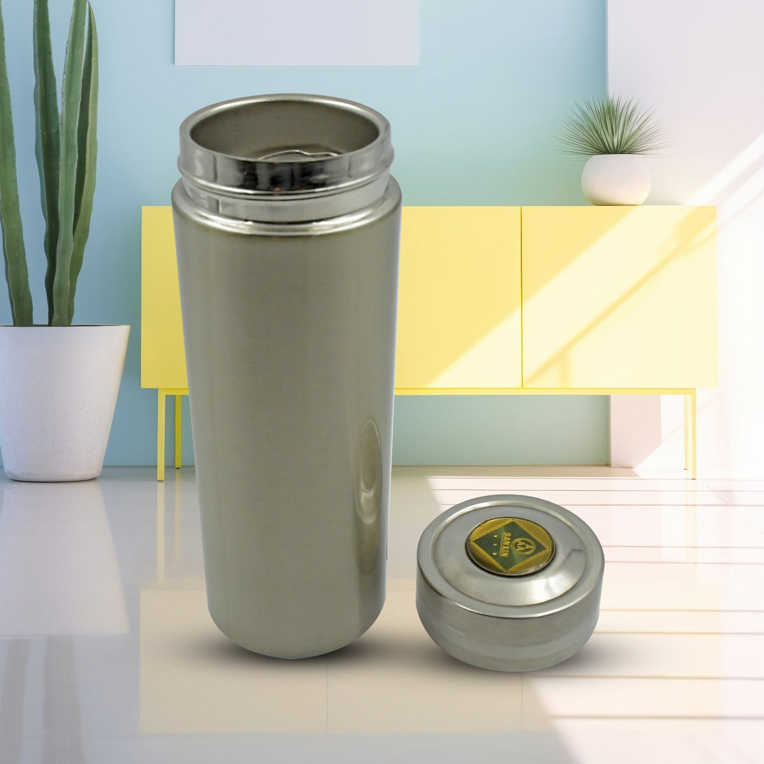 The insulated flask displayed with its robust, food-grade stainless steel construction.