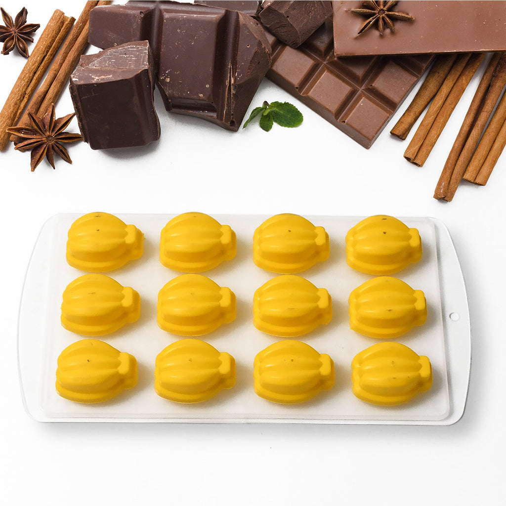 Detailed view of the silicone ice cube tray showcasing banana, grape, and other fun fruit shapes.