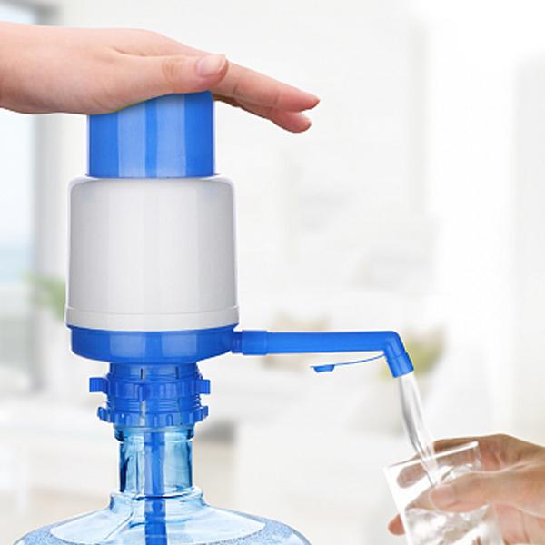 Detailed view of the Hand Press Water Pump's food-grade plastic components.