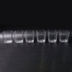 Side view of transparent diamond plastic glass set
